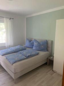 Postel nebo postele na pokoji v ubytování Ferienhaus Lara