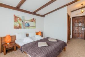 Postel nebo postele na pokoji v ubytování Transylvanian Inn