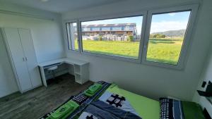Uma cama ou camas num quarto em BeachIN - Sport, Events, Hotel, Restaurant, Bar