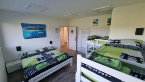 Uma cama ou camas num quarto em BeachIN - Sport, Events, Hotel, Restaurant, Bar