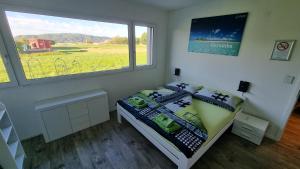 Uma cama ou camas num quarto em BeachIN - Sport, Events, Hotel, Restaurant, Bar