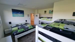 Uma cama ou camas num quarto em BeachIN - Sport, Events, Hotel, Restaurant, Bar