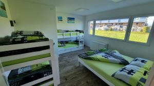 Uma cama ou camas num quarto em BeachIN - Sport, Events, Hotel, Restaurant, Bar