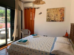 A bed or beds in a room at TROPEA BIANCA