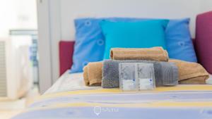 Postel nebo postele na pokoji v ubytování Cozy Apartment Alghero