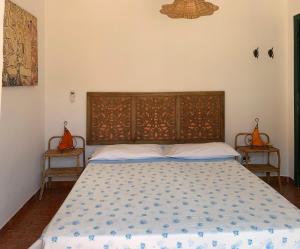 A bed or beds in a room at TROPEA BIANCA
