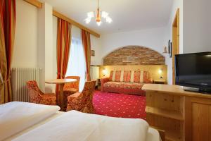 Postel nebo postele na pokoji v ubytování Hotel Ronce