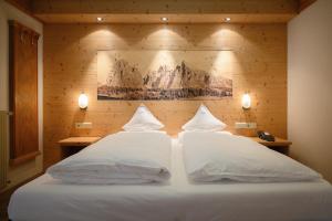 Postel nebo postele na pokoji v ubytování Hotel Ronce