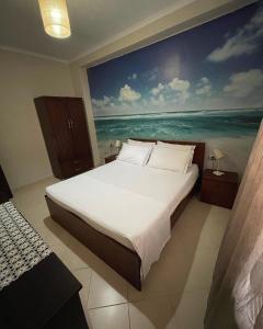 เตียงในห้องที่ Vila Florika Hotel