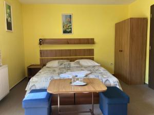 Postel nebo postele na pokoji v ubytování Penzión Timea Zuberec