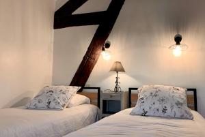 Letto o letti in una camera di Hotel Savel