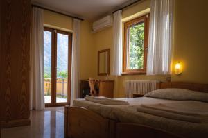 A bed or beds in a room at Agriturismo la campagnola