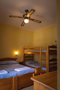 A bed or beds in a room at Agriturismo la campagnola