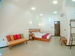 Postel nebo postele na pokoji v ubytování Hotel Anaulundawa