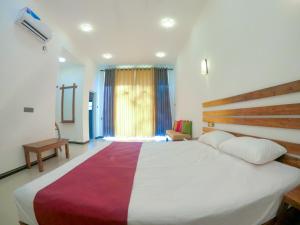 Postel nebo postele na pokoji v ubytování Hotel Anaulundawa