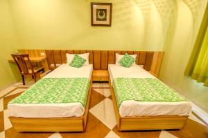 Letto o letti in una camera di Gems Suites-A Boutique Stay