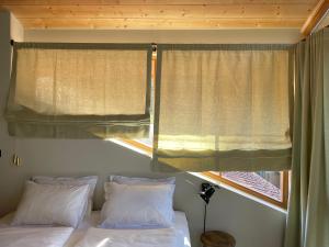 Postel nebo postele na pokoji v ubytování STUBN in der Frasdorfer Hütte
