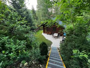Vonkajšia záhrada v ubytovaní Apartament nad Śperką