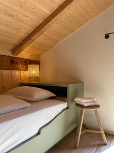 Postel nebo postele na pokoji v ubytování STUBN in der Frasdorfer Hütte