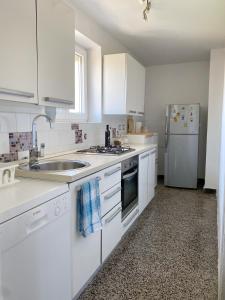 Kuchyňa alebo kuchynka v ubytovaní Kate Apartment