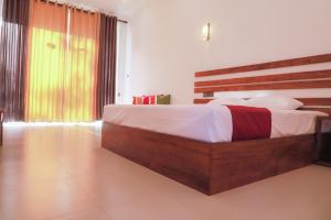 Postel nebo postele na pokoji v ubytování Hotel Anaulundawa