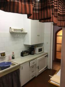 Kuchyňa alebo kuchynka v ubytovaní Casa iaia