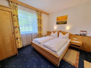 Postel nebo postele na pokoji v ubytování Das Landhaus