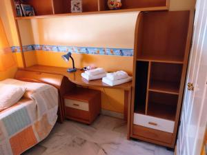 Säng eller sängar i ett rum på Casa Bahía de Cádiz