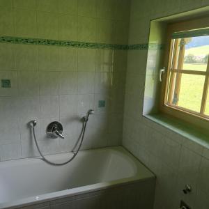 Łazienka w obiekcie Ferienwohnung Zillertaler Alpenblick