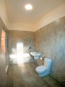 Koupelna v ubytování Hotel Anaulundawa