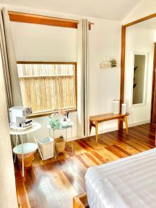 Postel nebo postele na pokoji v ubytování Nibbana Bungalows