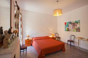 A bed or beds in a room at Gîte Du Pont - Piana