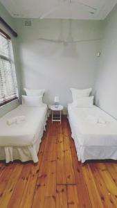 Cama ou camas em um quarto em Everly4 Guest Apartment