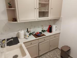Nápoje v ubytování Zeus Apartment