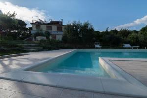 Bazén v ubytovaní Poggio delle Rose Tuscany Relais alebo v jeho blízkosti