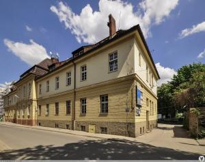 an old building on the side of a street at Hostel BAZA 15 in Wrocław