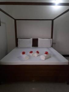 Voodi või voodid majutusasutuse Marashi Villa toas