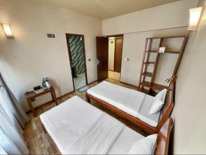Letto o letti in una camera di Sabila Boutique Hotel