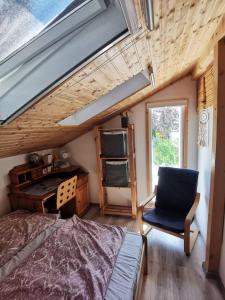 Posteľ alebo postele v izbe v ubytovaní Kaméleon Apartmanház EV töltéssel