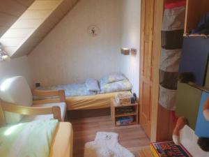 Posteľ alebo postele v izbe v ubytovaní Kaméleon Apartmanház EV töltéssel