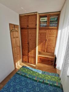 Posteľ alebo postele v izbe v ubytovaní Kaméleon Apartmanház EV töltéssel