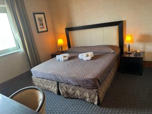 Postel nebo postele na pokoji v ubytování Hotel La Fenice