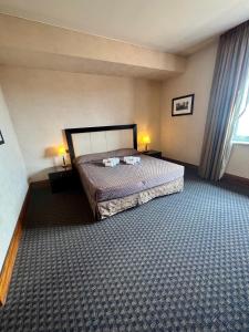 Postel nebo postele na pokoji v ubytování Hotel La Fenice