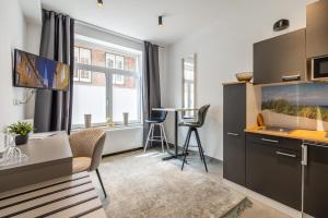 Kuchyň nebo kuchyňský kout v ubytování Hotel KO15