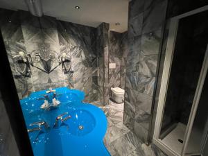 Koupelna v ubytování Hotel La Fenice