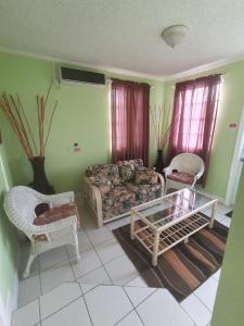 Ένα ή περισσότερα κρεβάτια σε δωμάτιο στο Burns' Apartment