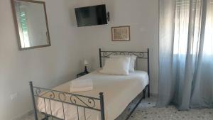 Posteľ alebo postele v izbe v ubytovaní Le Stanze di Ginevra 1-Caserta-