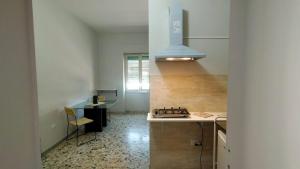 Kuchyňa alebo kuchynka v ubytovaní Le Stanze di Ginevra 1-Caserta-