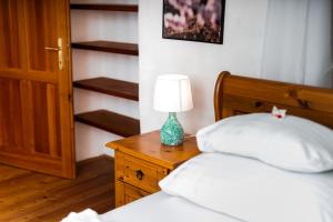 Voodi või voodid majutusasutuse Smile Apartments mit Donaublick toas