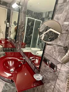 Koupelna v ubytování Hotel La Fenice